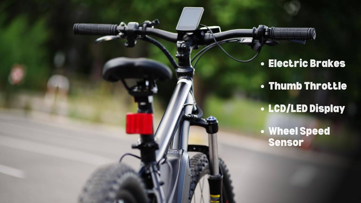 Electric bike with electric brakes, thumb throttle, clear LCD/LED display, and wheel speed sensor