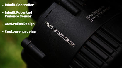 Close-up view of a mid-drive electric motor for an e-bike, featuring an inbuilt controller and patented cadence sensor, designed in Australia with custom engraving by TAV Systems